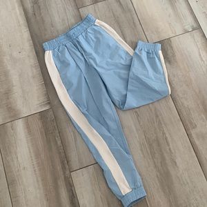 Fabletics blue and white stripe track pants, size small